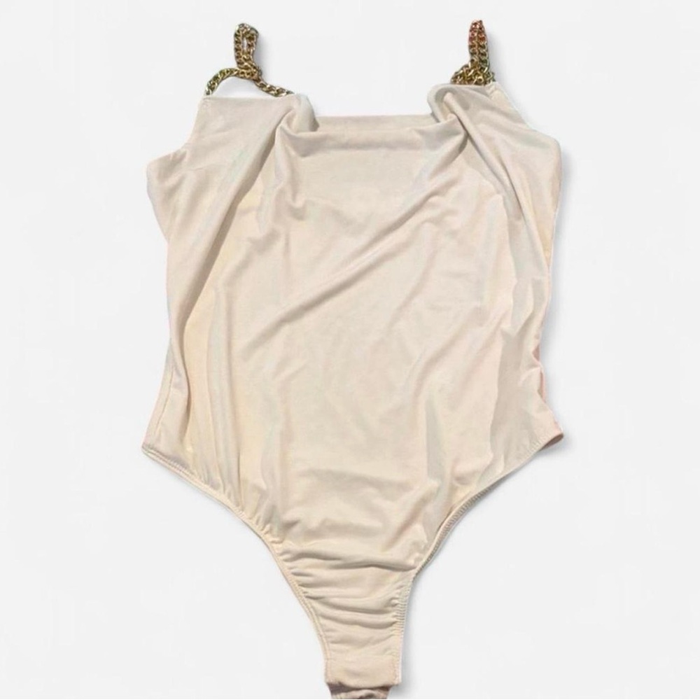 Elegant White Bodysuit with Gold Chain Straps